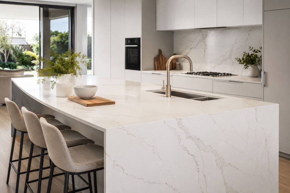Custom stone benchtop with marble-look veining in a modern Perth kitchen renovation