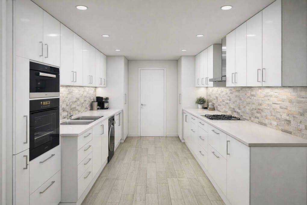 A small, modern galley kitchen with consistent high-gloss white cabinets and matching handles throughout.