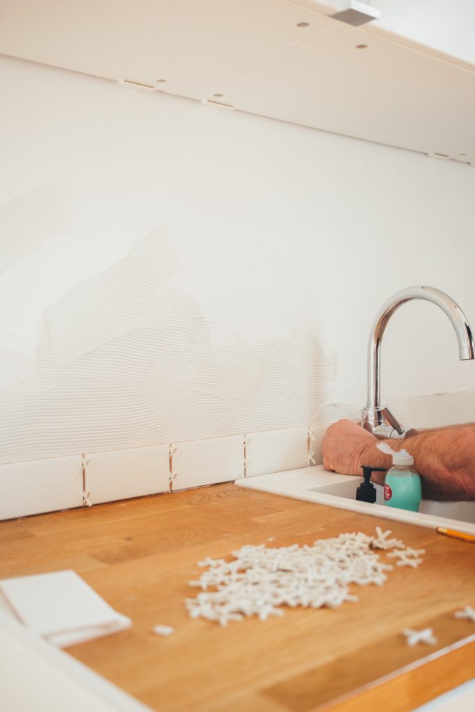 Laying First Row of Tiles
