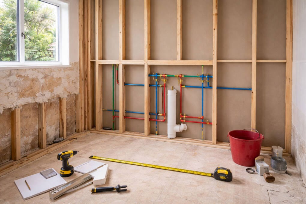 Perth bathroom renovation in progress showing wall framing and plumbing rough-in stage