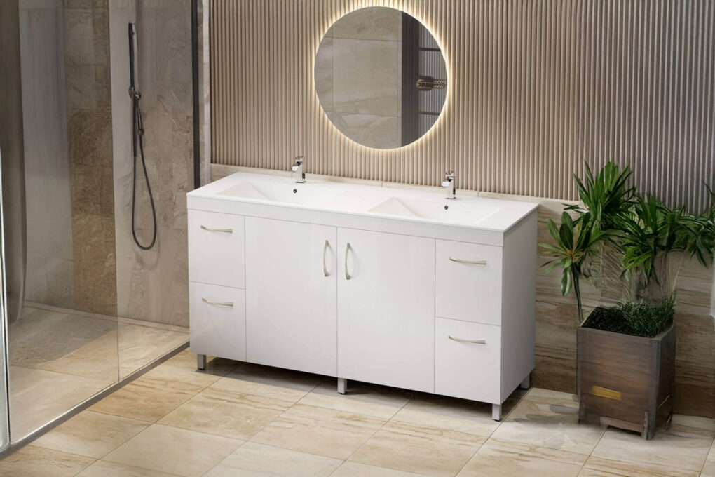 Luxury bathroom vanity with LED backlit round mirror, white double basins, beige marble tiles, vertical wood slat wall, glass shower partition and modern potted plant