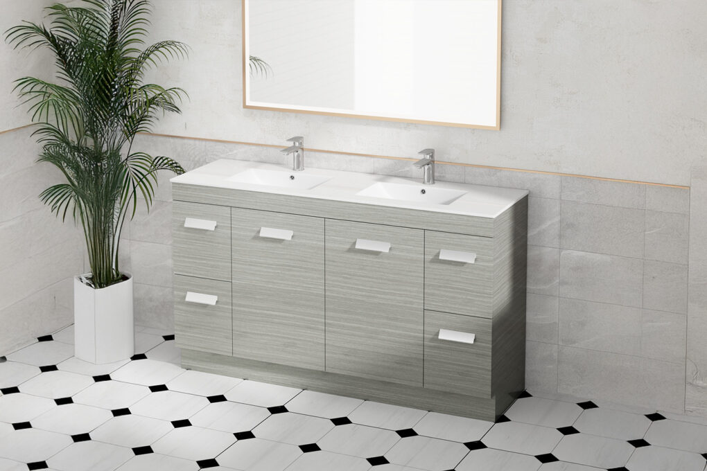 Contemporary gray double vanity with white countertop, geometric black and white floor tiles, palm plant decor, and minimalist framed mirror in modern bathroom
