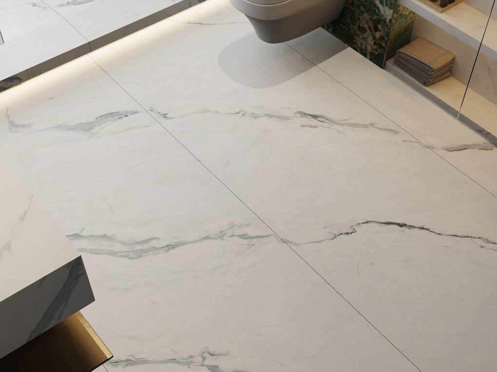 White marble-look floor tiles with subtle grey veining in a modern bathroom