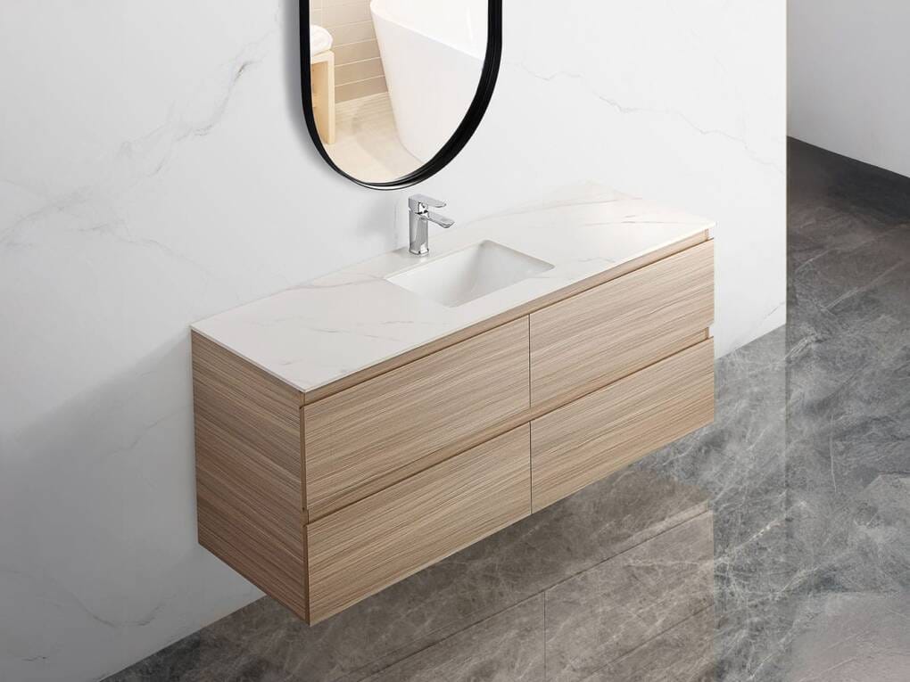 Side angle of single bowl integrated vanity top in white Mountain Snow finish