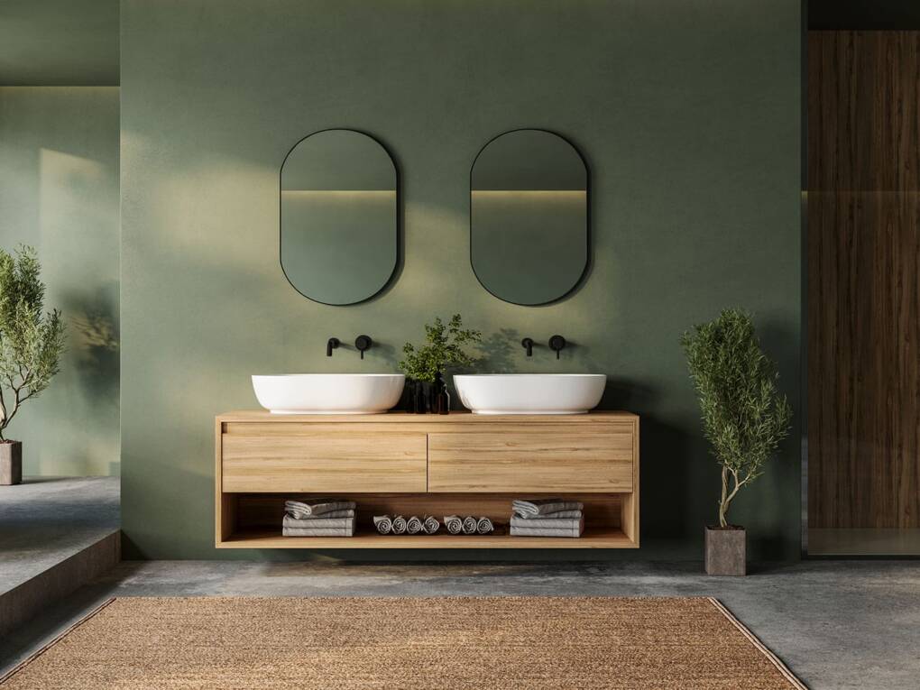 On-trend bathroom for 2025 with sage green walls, timber vanity and black tapware