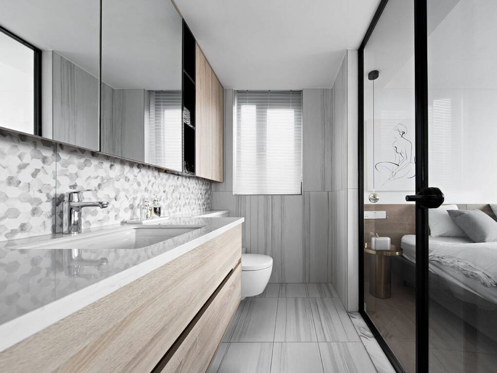 Compact modern bathroom in grey and white with timber vanity and hexagon tile splashback