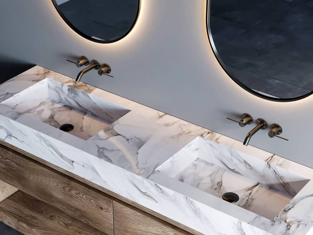 Marble benchtop with dual rectangular basins and three-piece tap sets