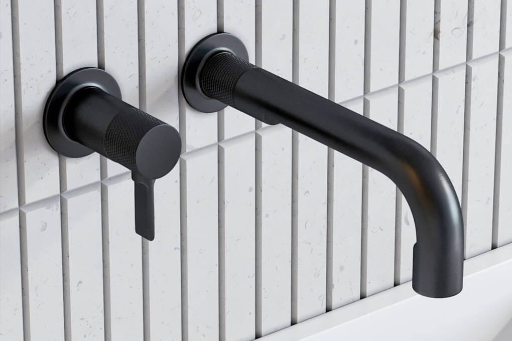 Matte black wall basin tapware with single mixer above a modern above-counter basin
