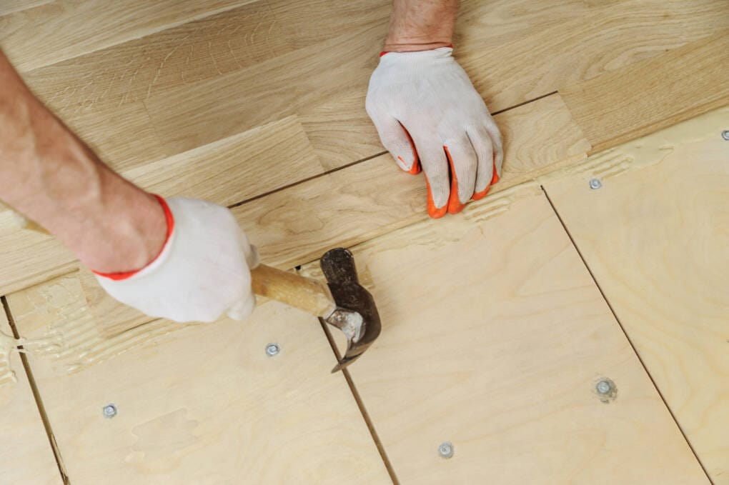 laying timber floorboards