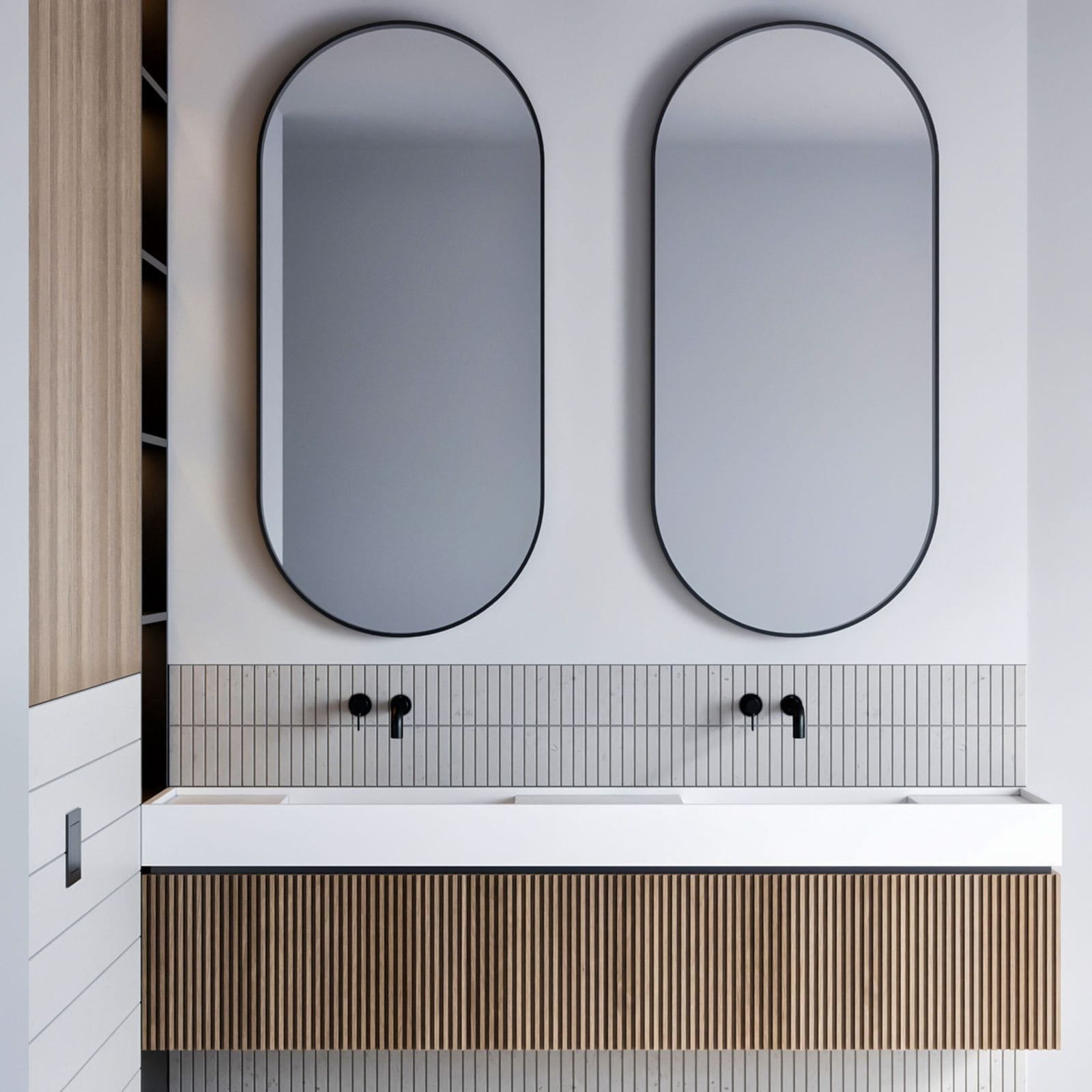Oval Black Framed Bathroom Mirrors above modern vanity