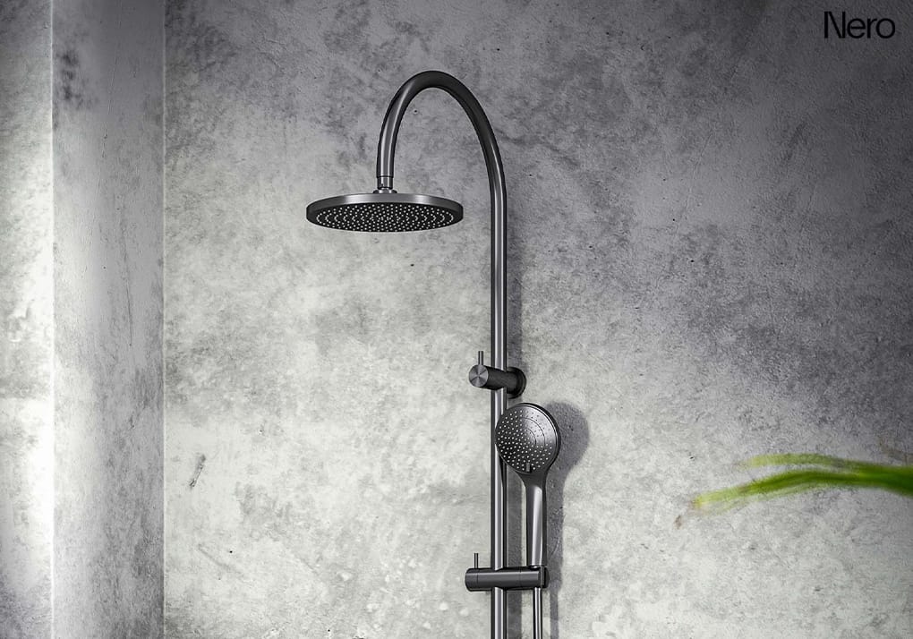 Gunmetal dual shower head with overhead rainfall shower and integrated handheld shower on a single rail.