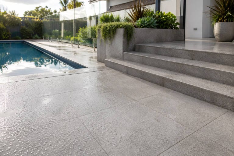 Non-slip outdoor tiles used across a Perth patio, pool area and steps