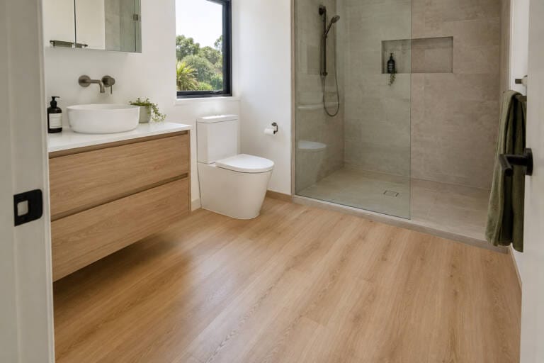 Hybrid flooring in the dry area of a Perth bathroom with a separate tiled shower